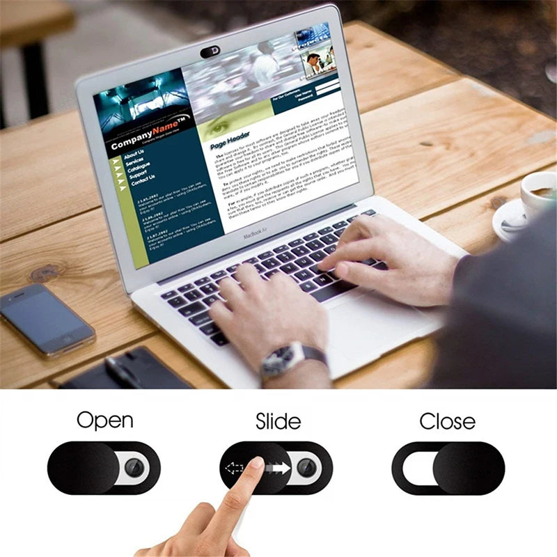 Person using a laptop with on-screen controls labeled 'Open', 'Slide', and 'Close'.