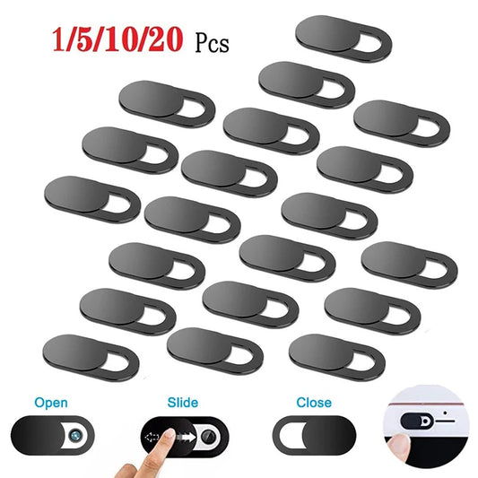 Set of black phone camera covers with usage instructions on a white background
