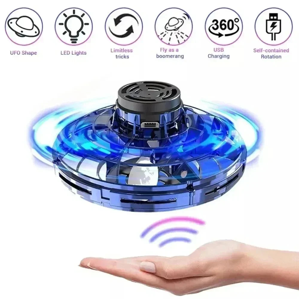 Blue UFO-shaped toy with LED lights on a white background