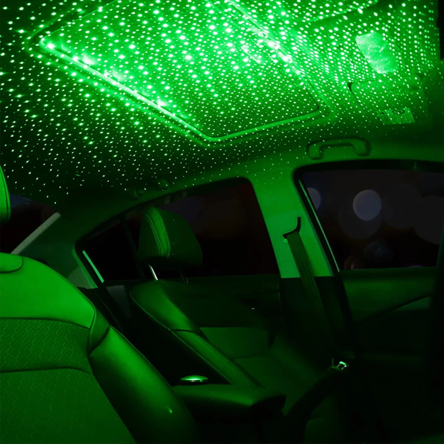 Car interior with green starlight ceiling effect