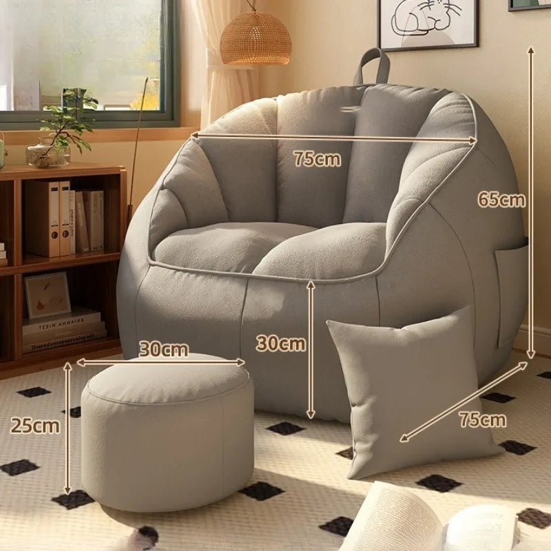 Gray armchair with dimensions marked in a living room setting