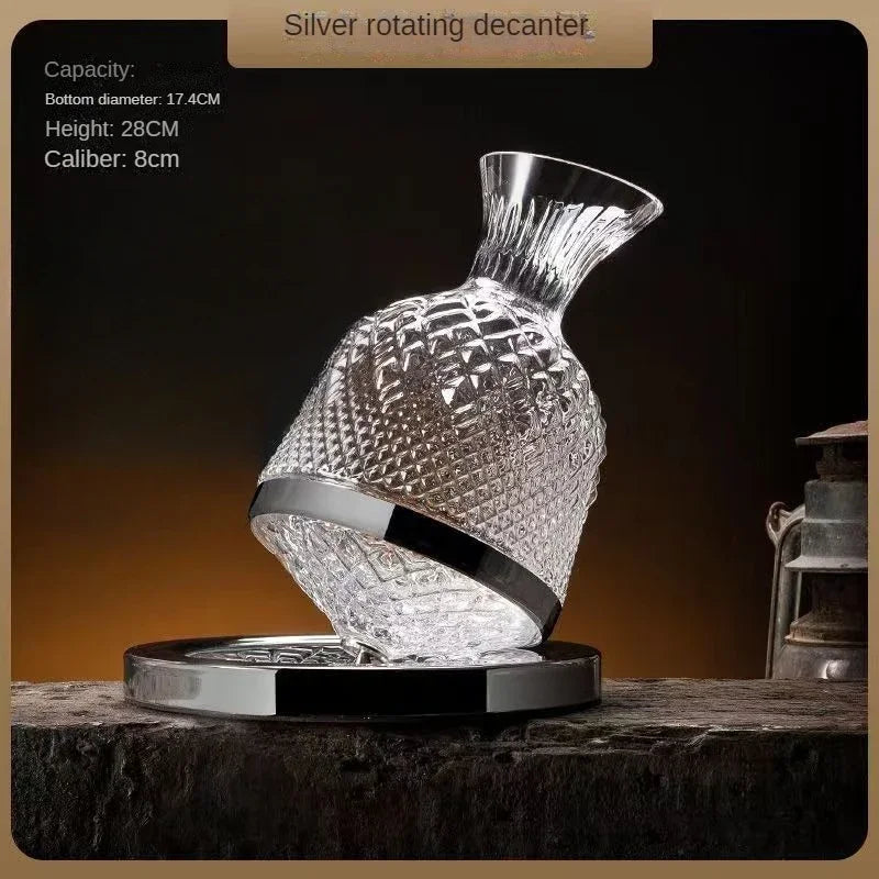 Silver rotating decanter on a dark background