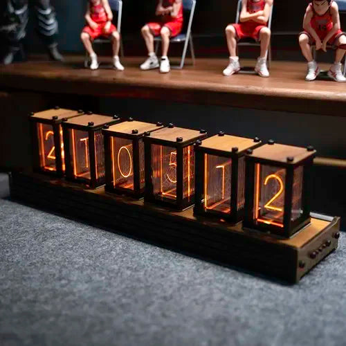 Digital clock with illuminated numbers on a dark surface