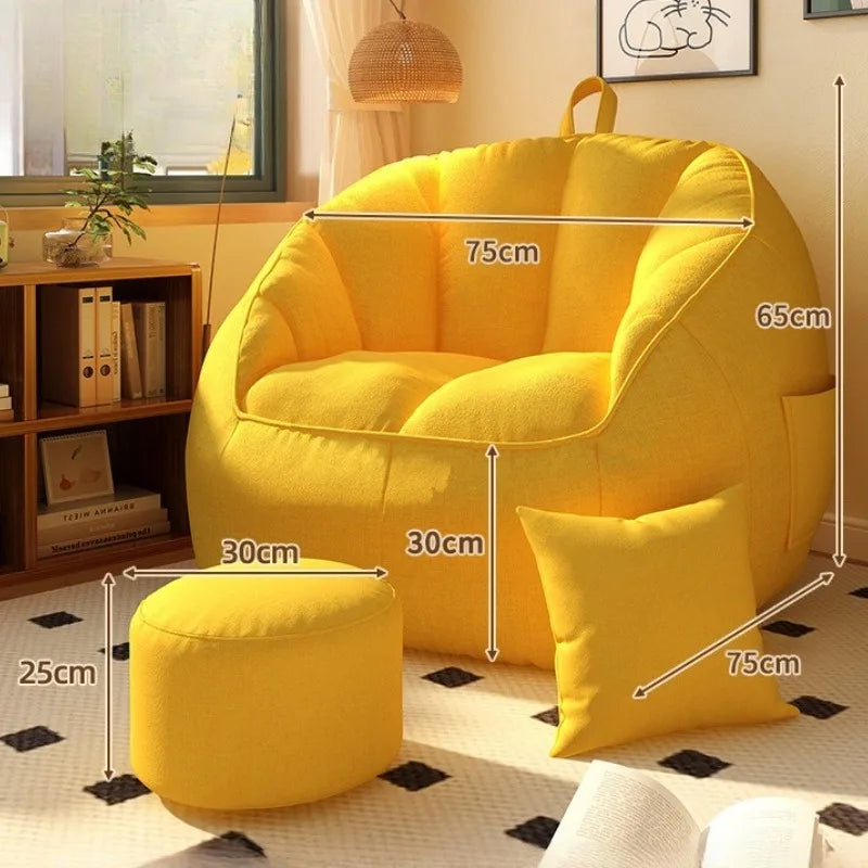 Yellow armchair with ottoman and measurements in a room setting