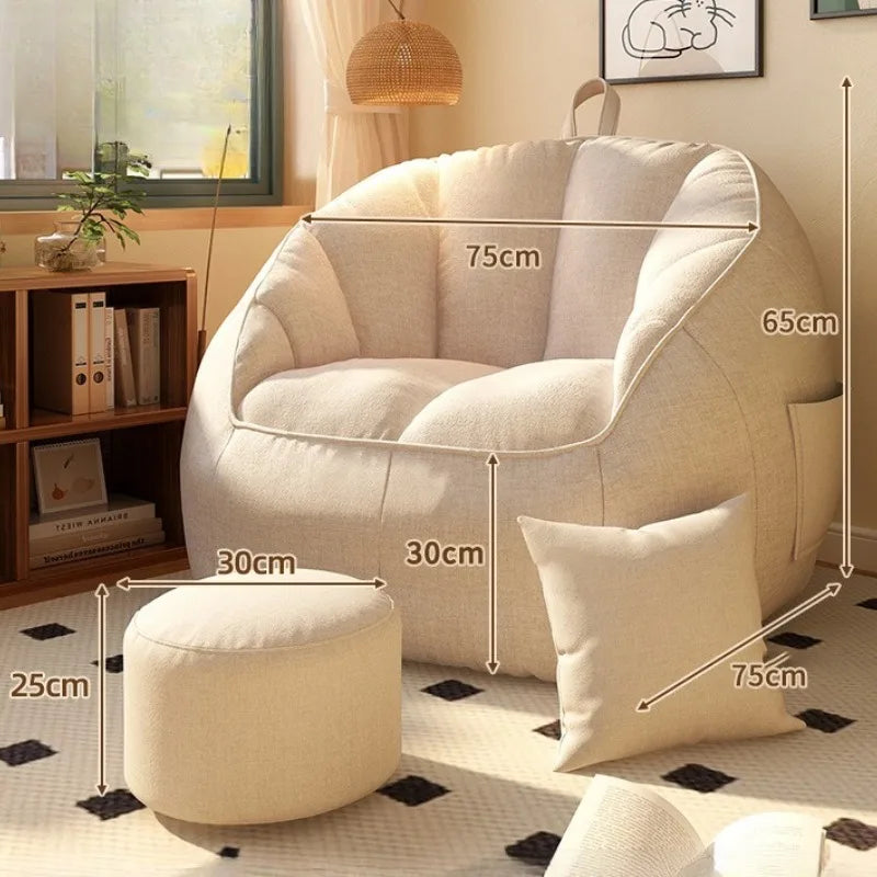 Beige armchair with ottoman and measurements in a room setting