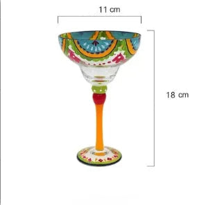 Colorful margarita glass with decorative patterns and measurements on a white background